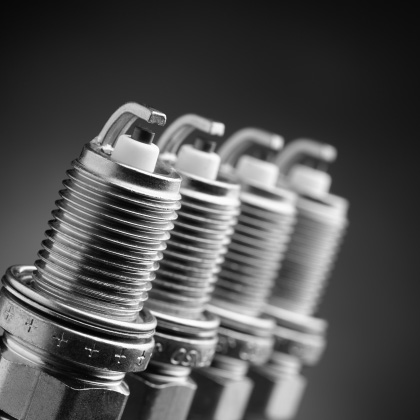 Spark plugs for automobiles